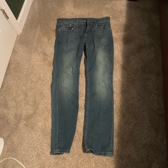 American Eagle Outfitters Other - A pair of American Eagle original riveted jeans.